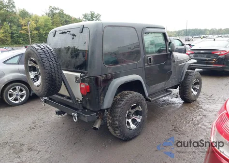 2004 Jeep Wrangler Sport z USA, uszkodzony, nr VIN 1J4FA49S34P706826